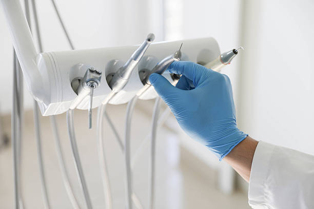 Professional Invisalign Clear Aligners technician working in Lakewood Park, FL
